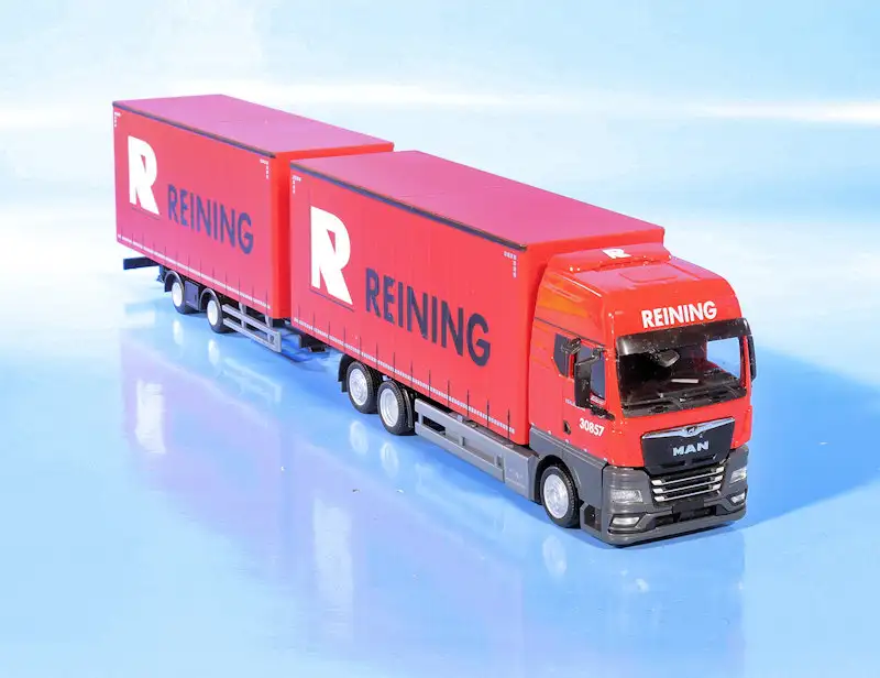 INT.Herpa 87.MAN TGX GX Reining(2)